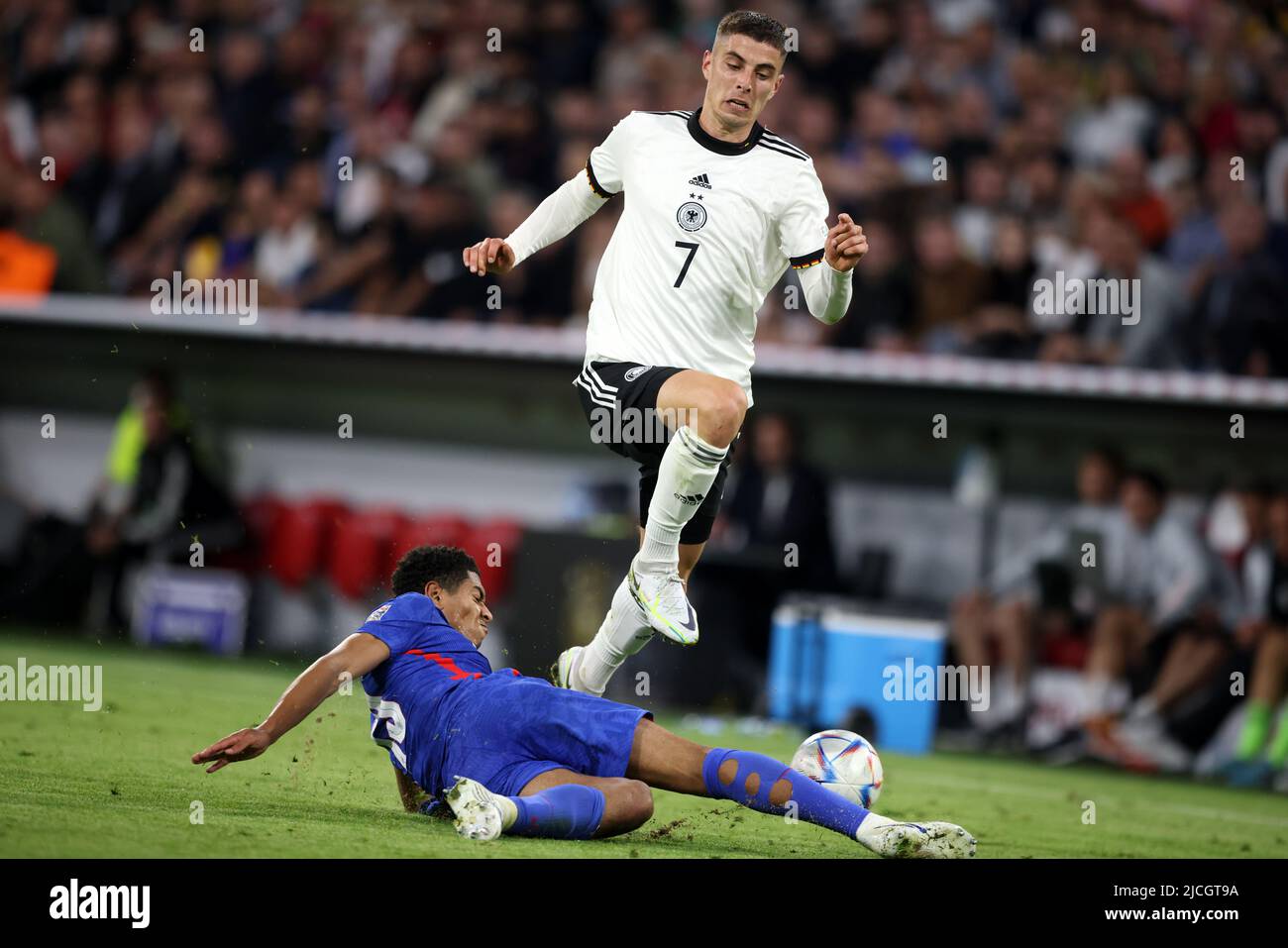Kai Havertz of germany 06 Jude Bellingham of England  MUNICH, GERMANY - JUNE 07:  UEFA Nations League League A Group 3 match between Germany and England at Allianz Arena on June 07, 2022 in Munich, Germany. Nations League Deutschland England  © diebilderwelt / Alamy Stock Stock Photo