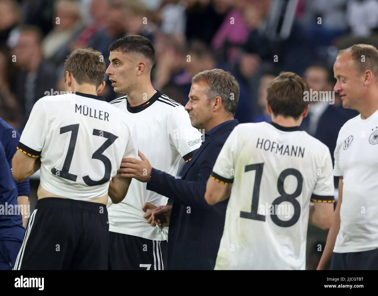 Head coach Hansi Flick  of germany  Thomas Mueller of germany Kai Havertz of germany 06 MUNICH, GERMANY - JUNE 07:  UEFA Nations League League A Group 3 match between Germany and England at Allianz Arena on June 07, 2022 in Munich, Germany. Nations League Deutschland England  © diebilderwelt / Alamy Stock Stock Photo