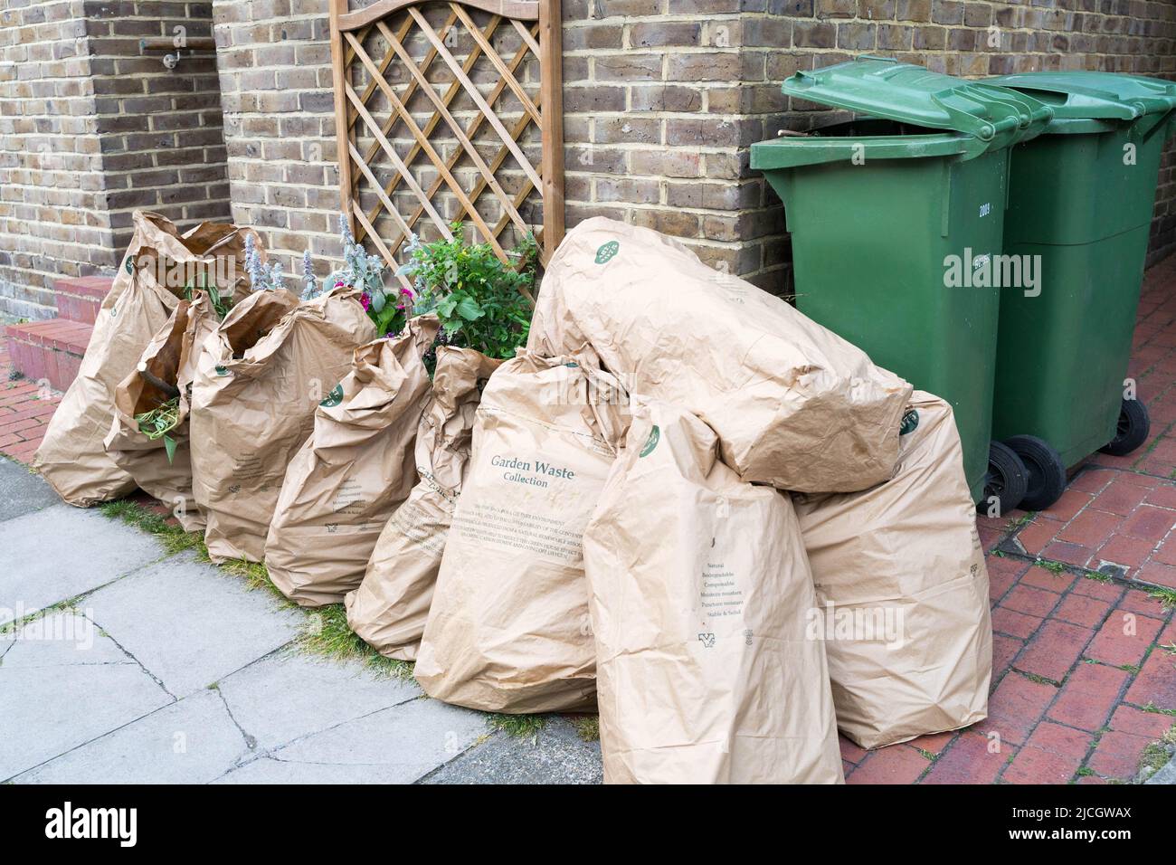 Paper Recycling Sacks full of garden wastes ready for collection on the