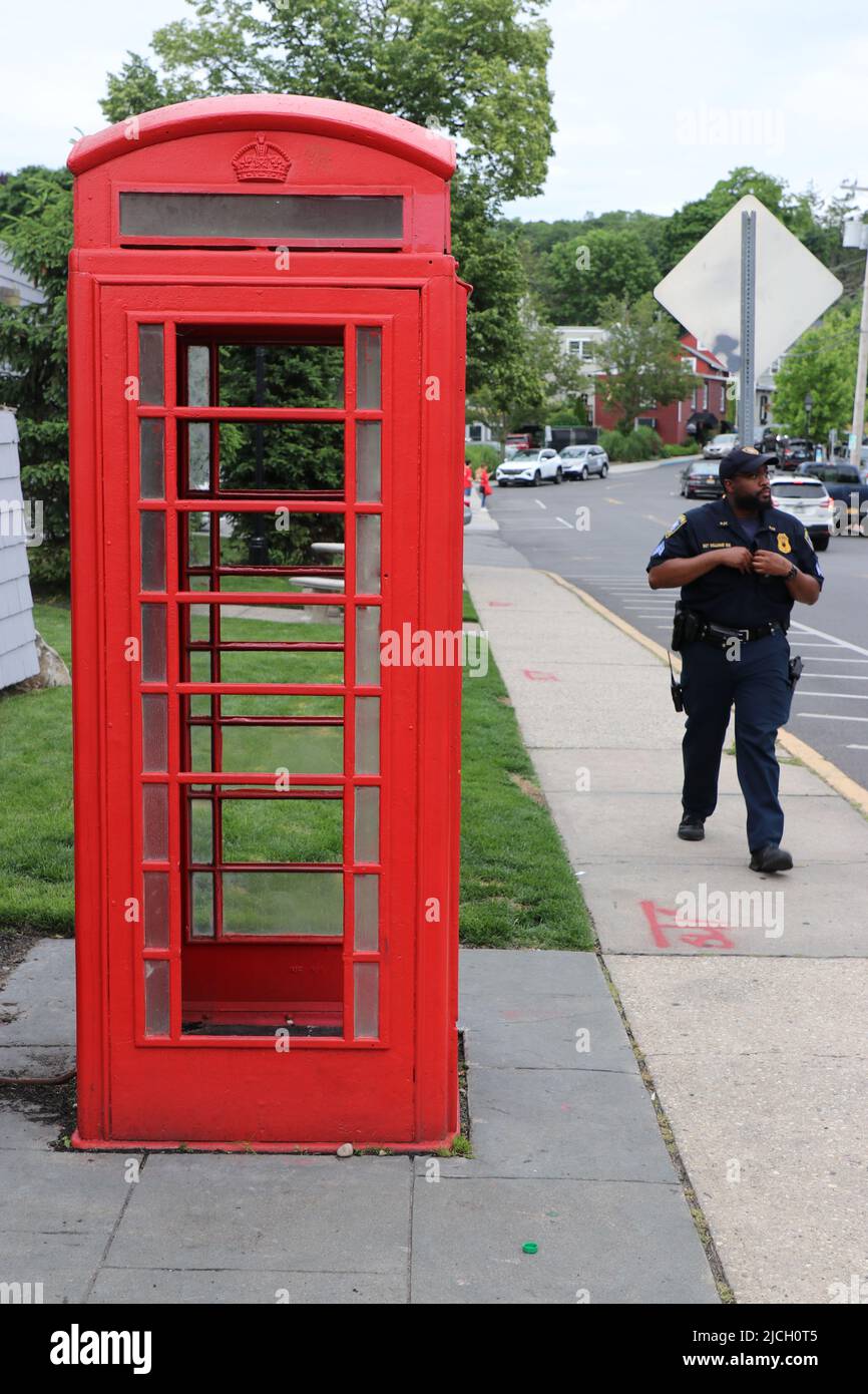 Red phone booth in downtown Port Jefferson Stock Photo Alamy