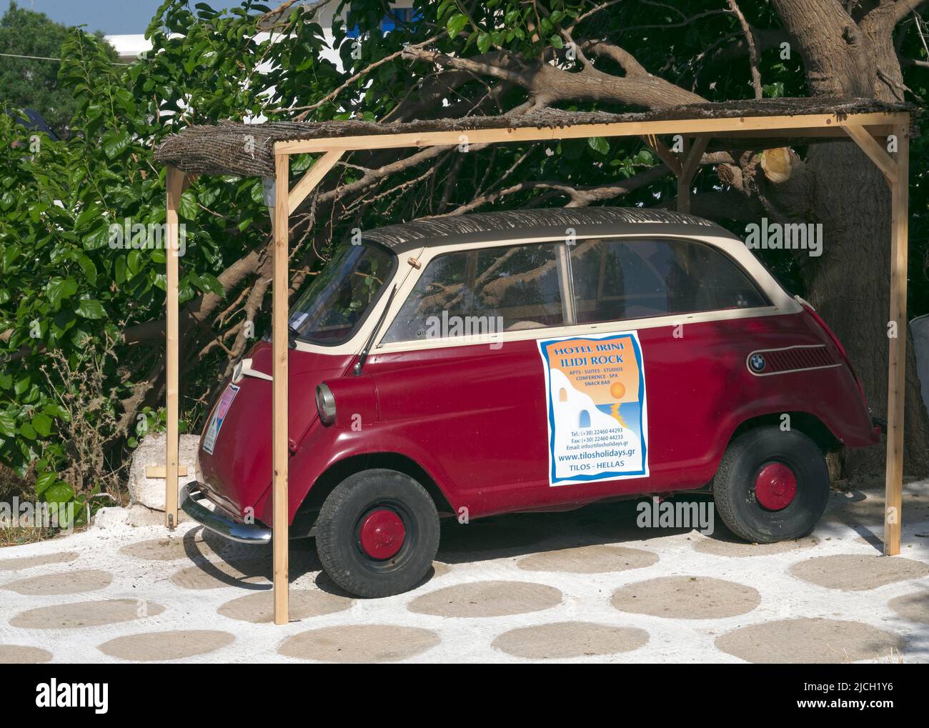 BMW Isetta 600, c 1958 vintage small car on Tilos island. Used as an advertisement for a local hotel Stock Photo