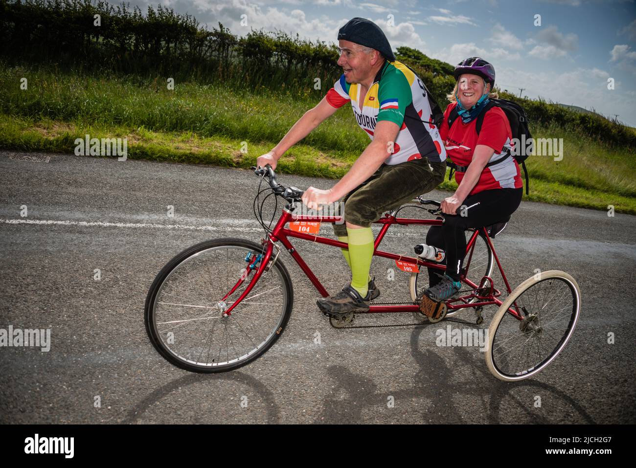 Tandem trike couple in Veloretro vintage cycling event, Ulverston, Cumbria, UK. Stock Photo