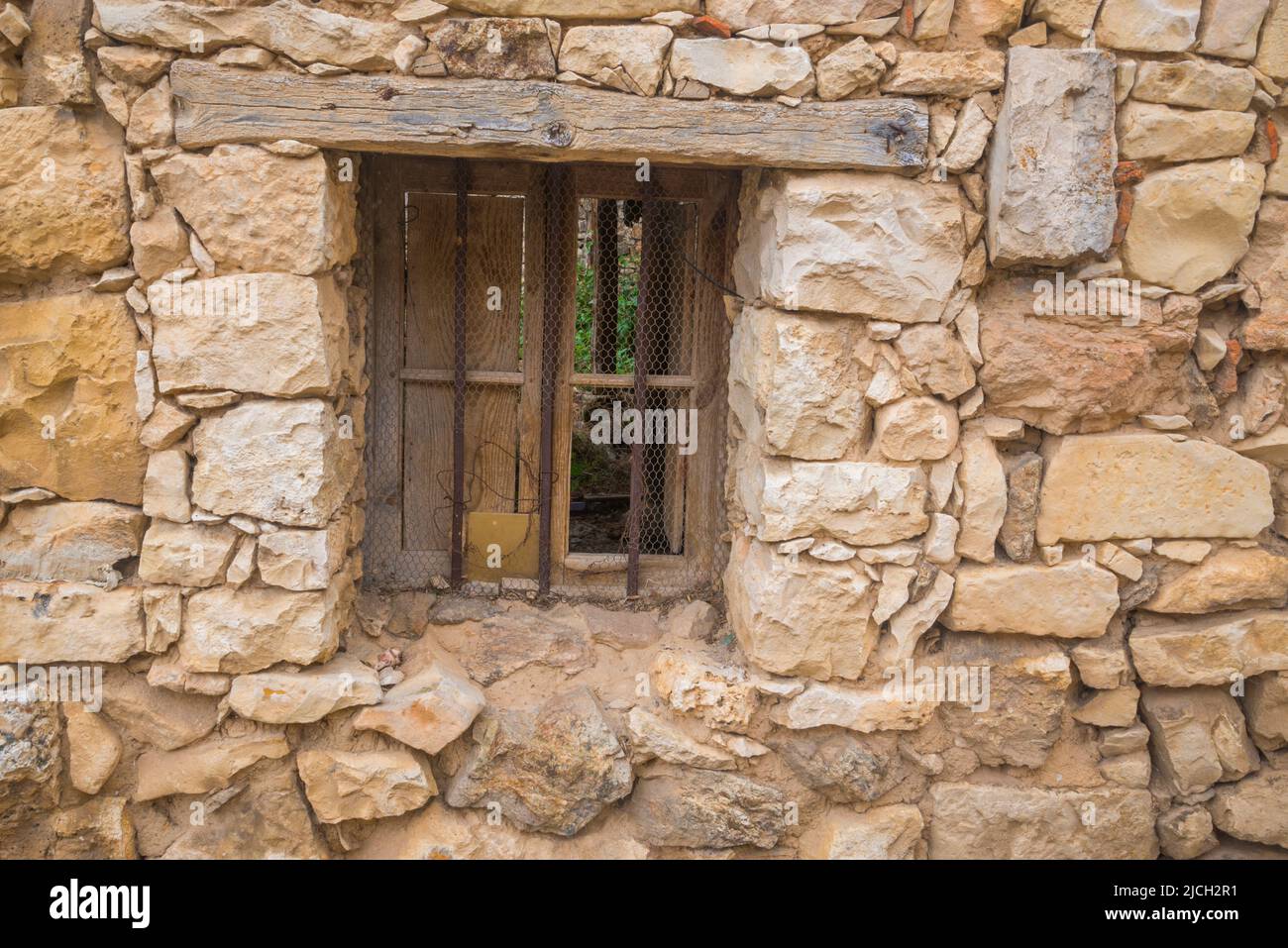 Window of house in ruins. Stock Photo