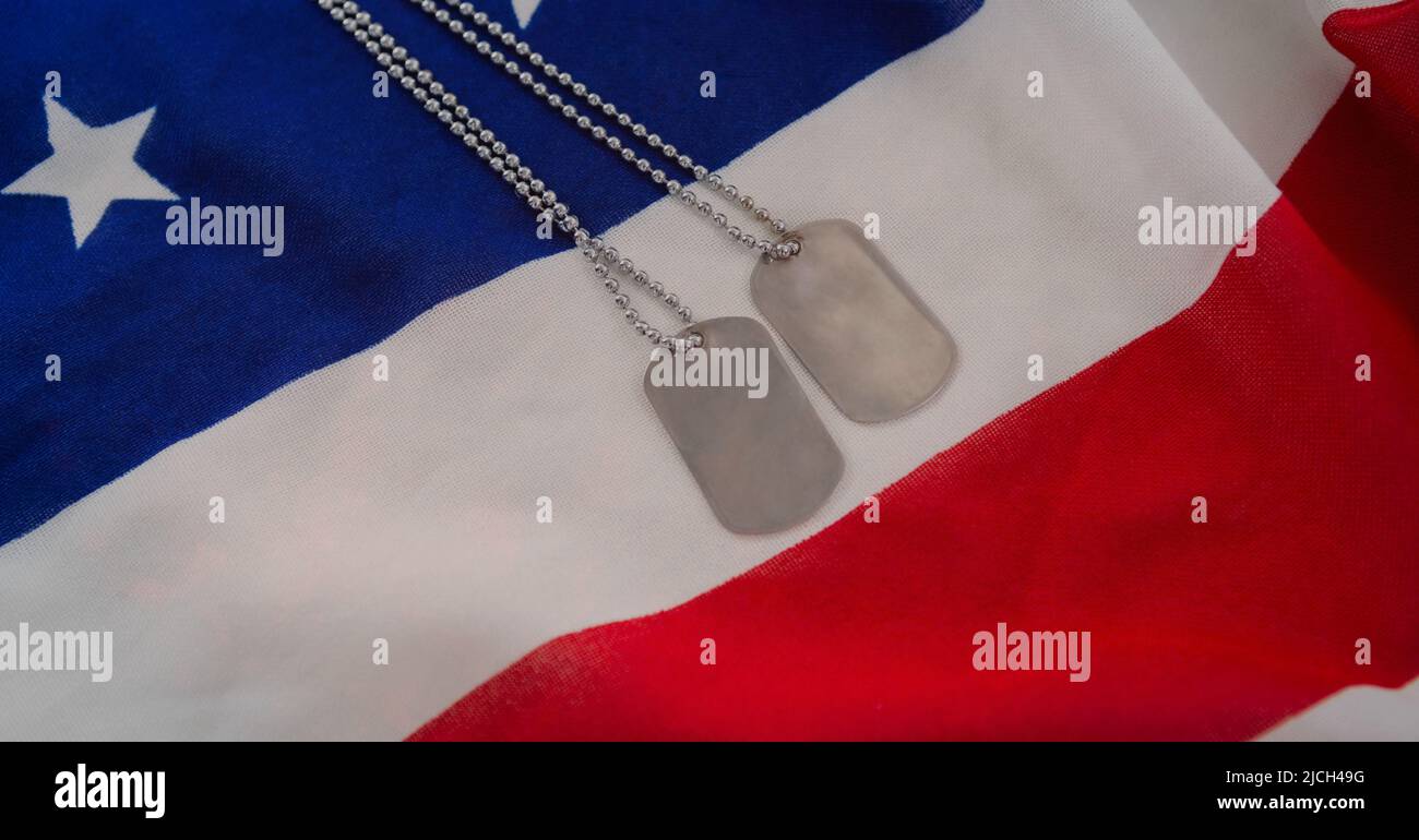 Military dog tags over american flag background with copy space Stock ...