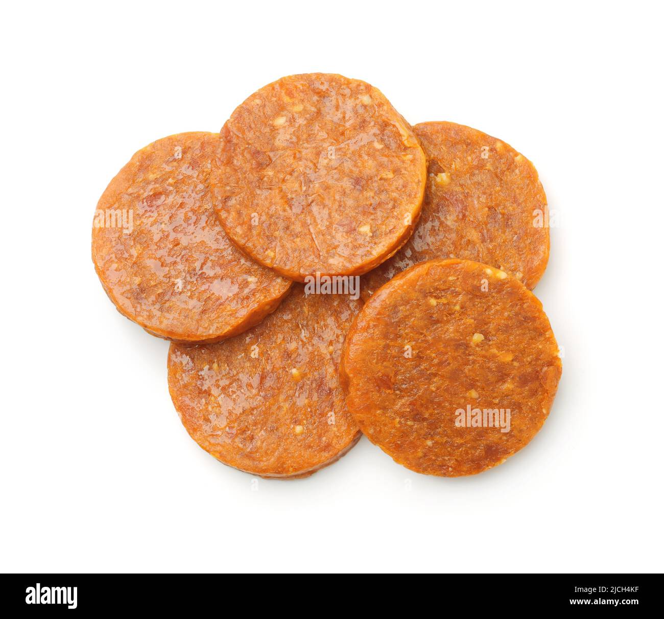 Top view of organic pressed dried apricot and almond discs dessert isolated on white Stock Photo