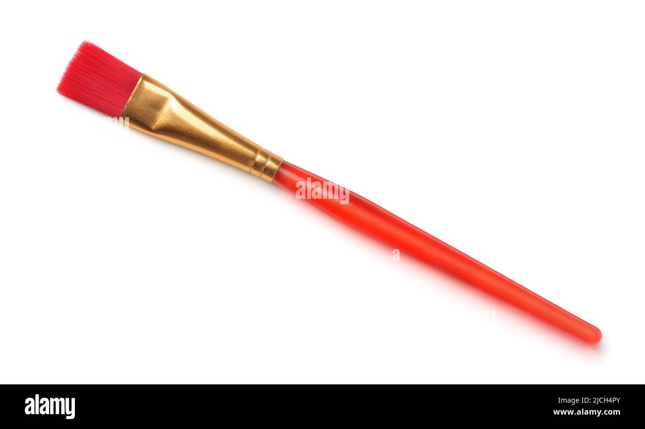Top view of red plastic paintbrush isolated on white Stock Photo