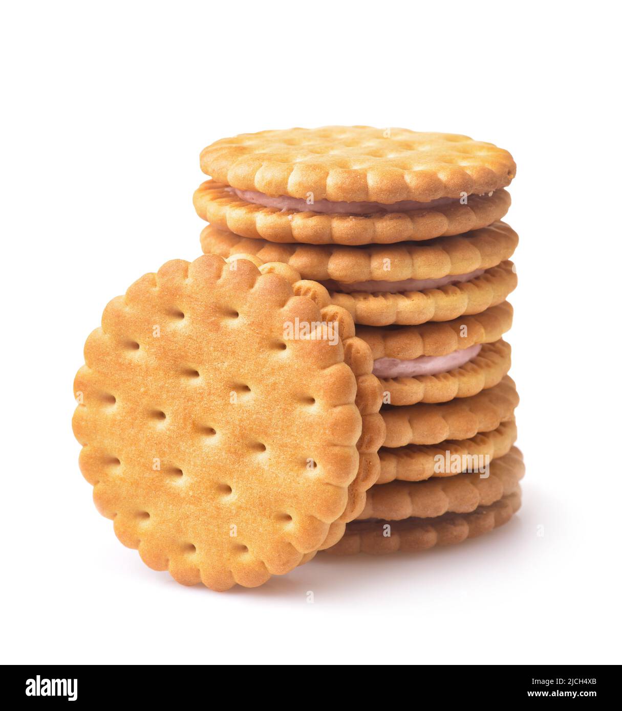 Stack of sandwich biscuits with fruit filling isolated on white Stock Photo