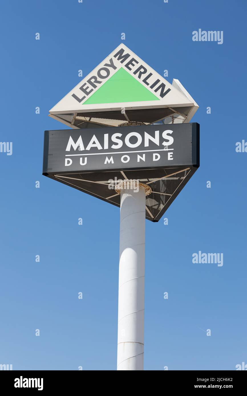 MASSANASSA, SPAIN - JUNE 06, 2022: Maisons du Monde and Leroy Merlin stores billboard Stock Photo