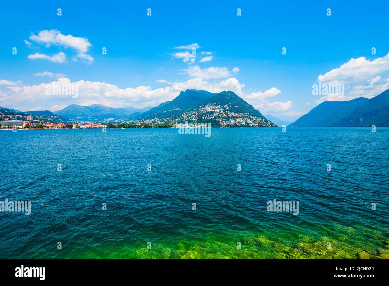 Lugano lake and Lugano city panoramic view in canton of Ticino in Switzerland Stock Photo