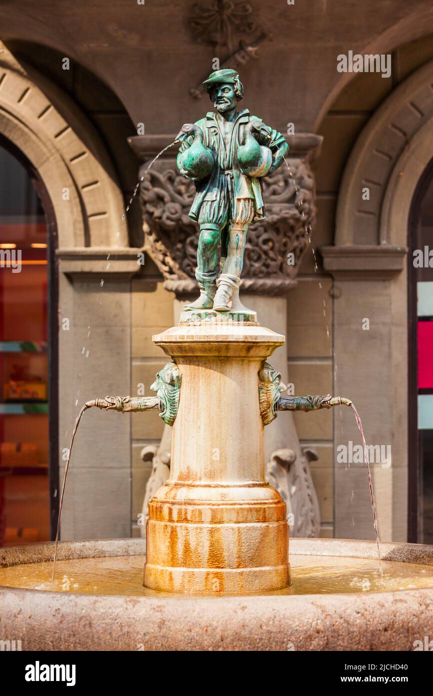 The Little Goose Man fountain at Hirschenplatz main square in Lucerne or Luzern city in central Switzerland. Stock Photo