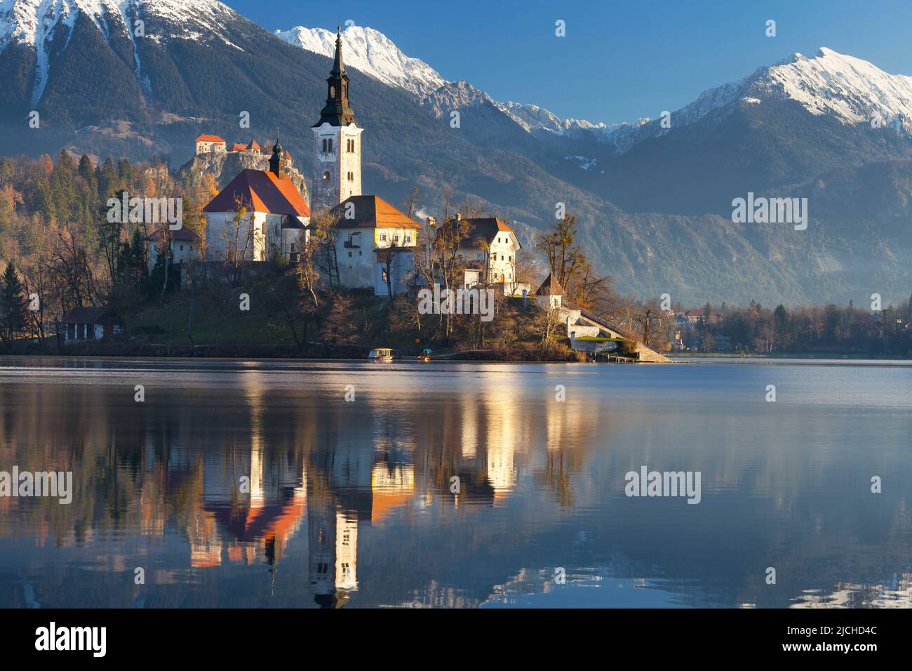 The Pilgrimage Church of the Assumption of Maria on Lake Bled and Bled Castle, Bled, Slovenia Stock Photo