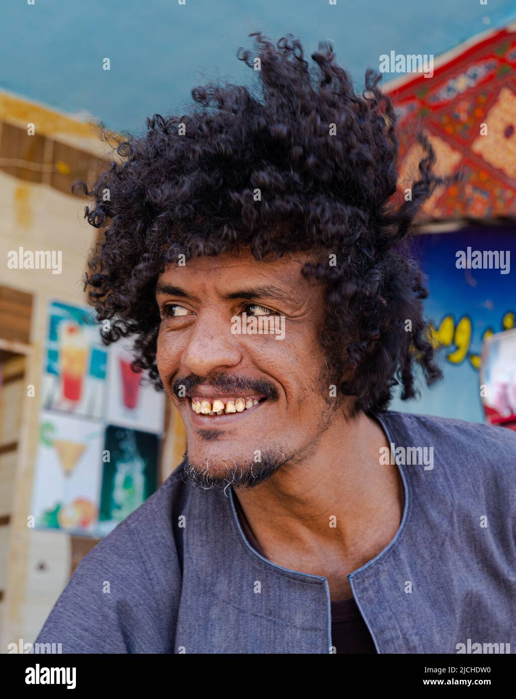 Happy curly arab man portrait Stock Photo