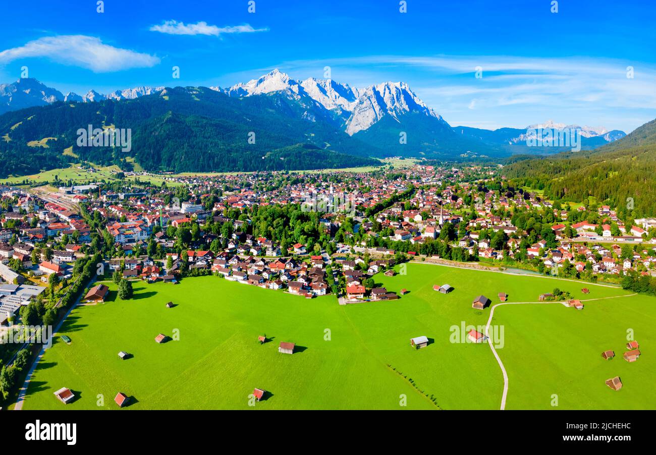 Garmisch-partenkirchen and Zugspitze mountain aerial panoramic view. Garmisch Partenkirchen is an Alpine ski town in Bavaria, southern Germany. Stock Photo