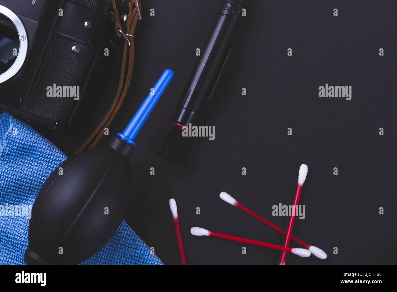 Cleaning of photographic equipment. Camera repair. Removing dust from