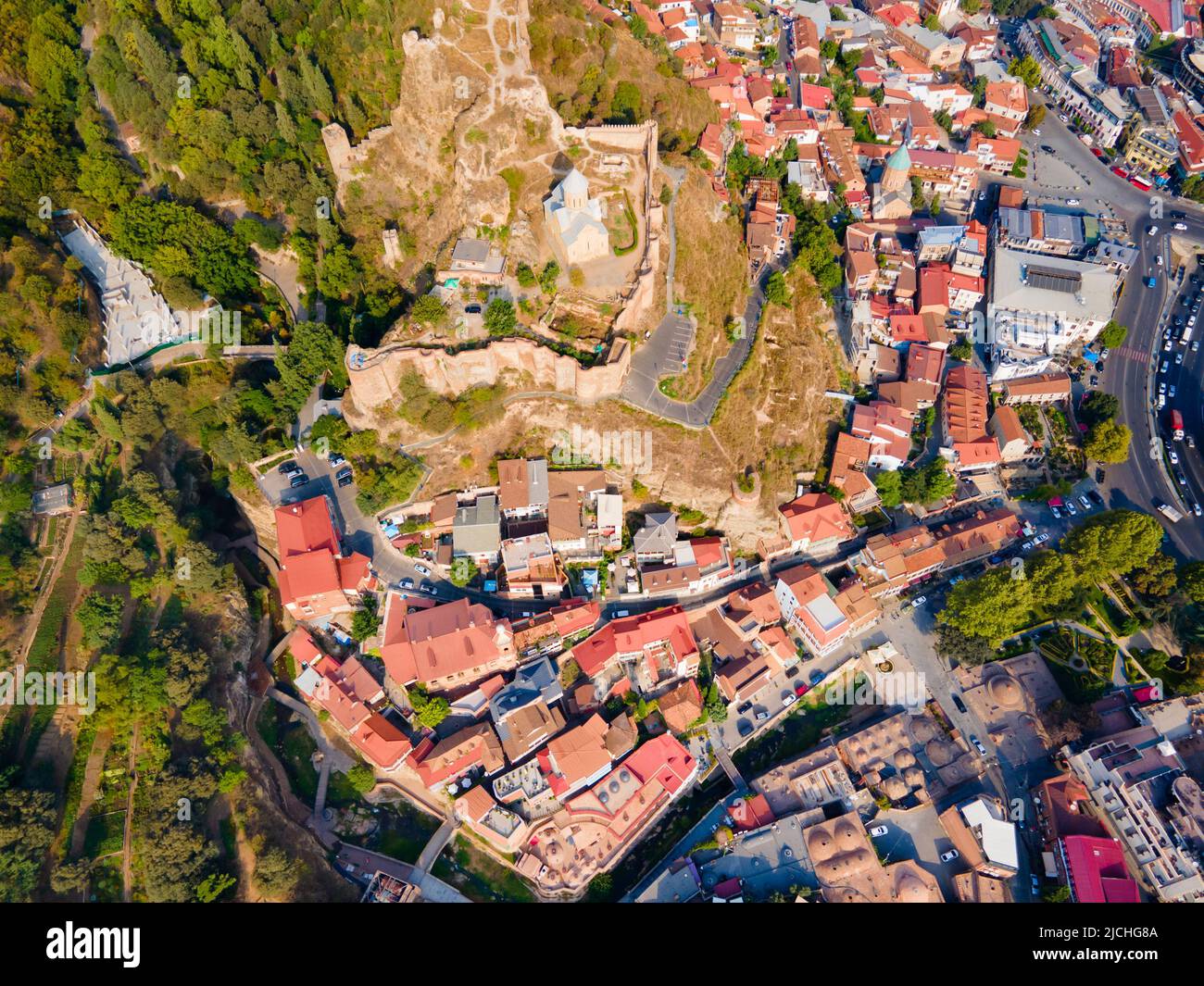 Abanotubani ancient district and Narikala fortress aerial panoramic view in Tbilisi old town. Tbilisi is the capital and the largest city of Georgia o Stock Photo