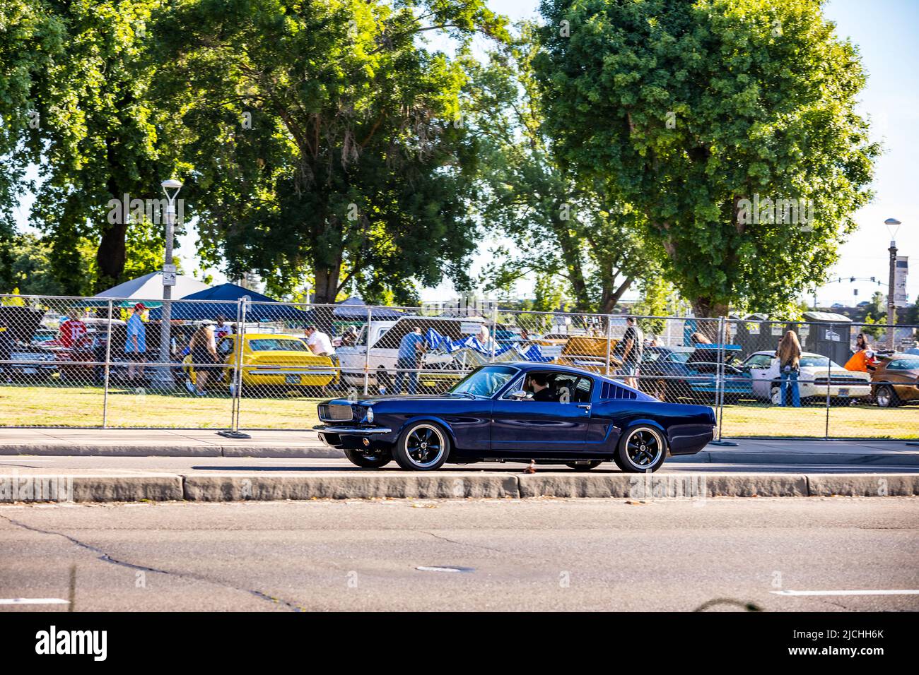 A 1966 Ford Mustang Fastback arrives at the American Graffiti charity Car Show at the Modesto Junior College campus June 11-12 2022 Stock Photo