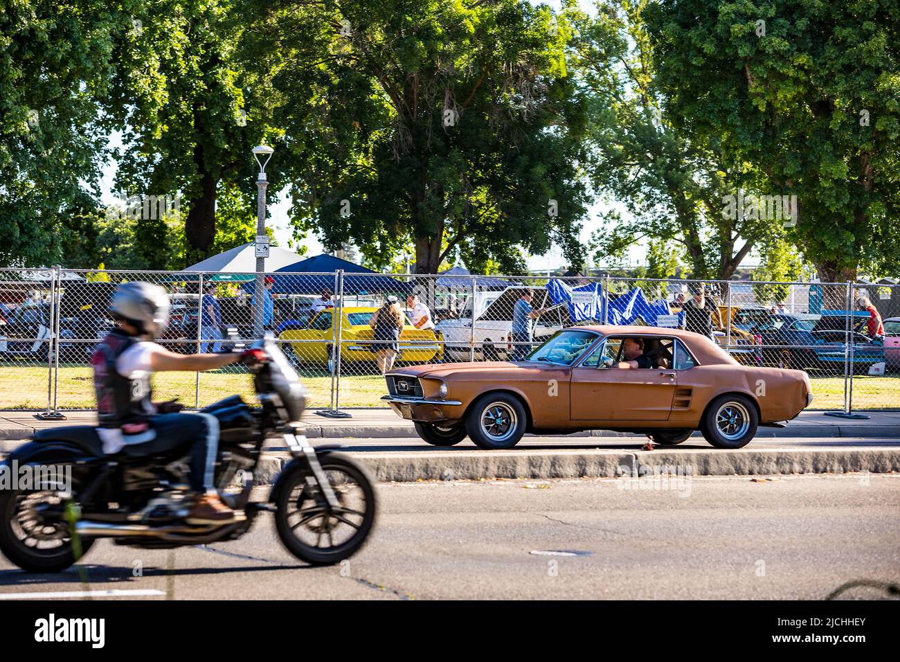 An unrestored 1967 Ford Mustang arrives at the American Graffiti charity Car Show at the Modesto Junior College campus June 11-12 2022 Stock Photo