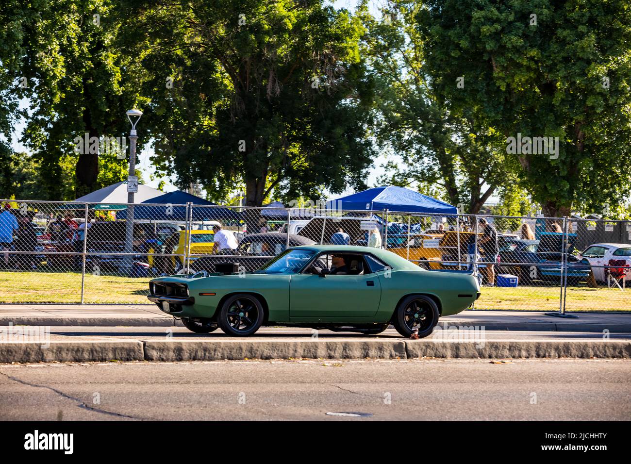 Cars arrive at the American Graffiti charity Car Show at the Modesto Junior College campus June 11-12 2022 Stock Photo