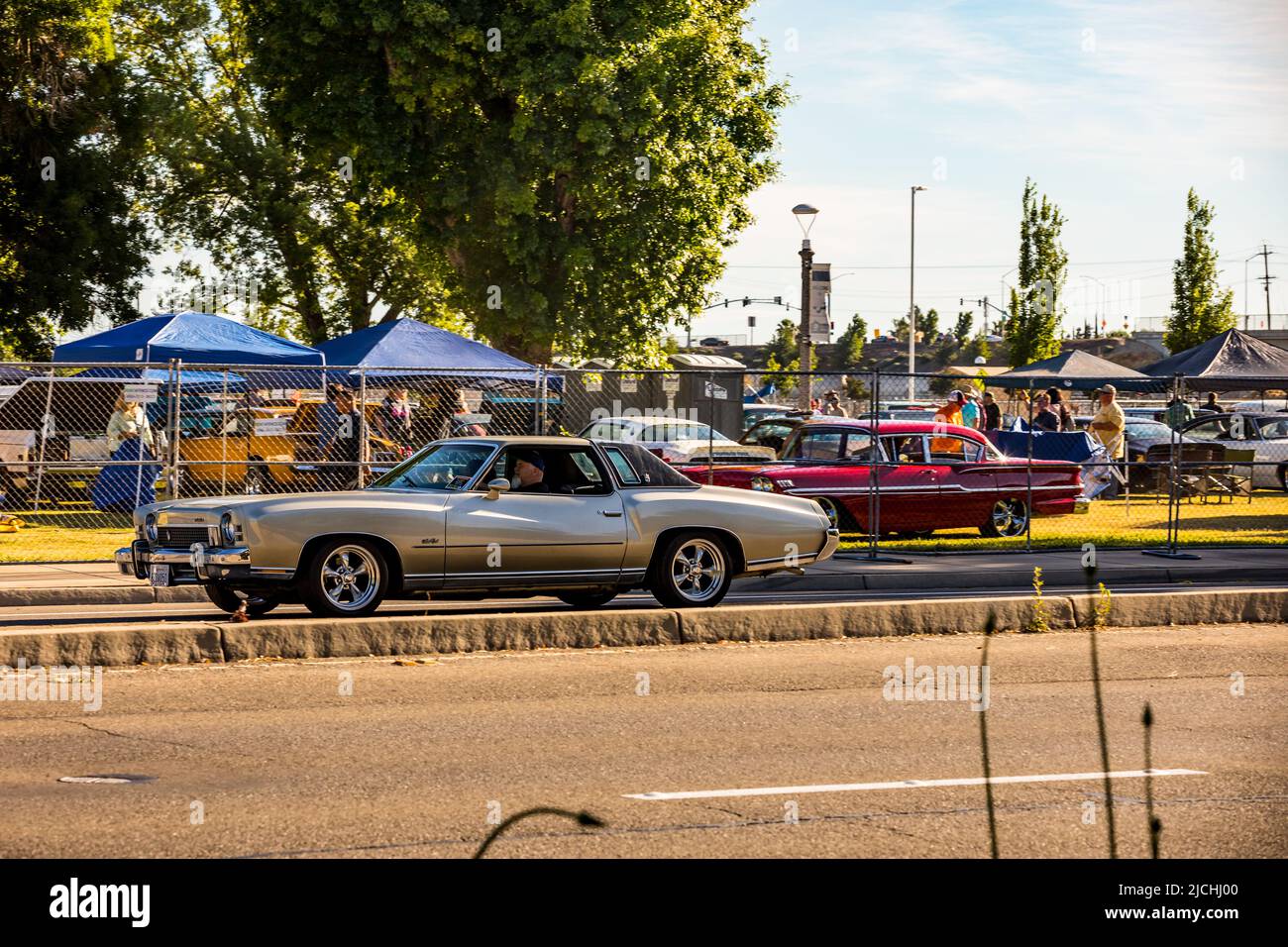 A 1973 Chevy Monte Carlo arrives at the American Graffiti charity Car Show at the Modesto Junior College campus June 11-12 2022 Stock Photo