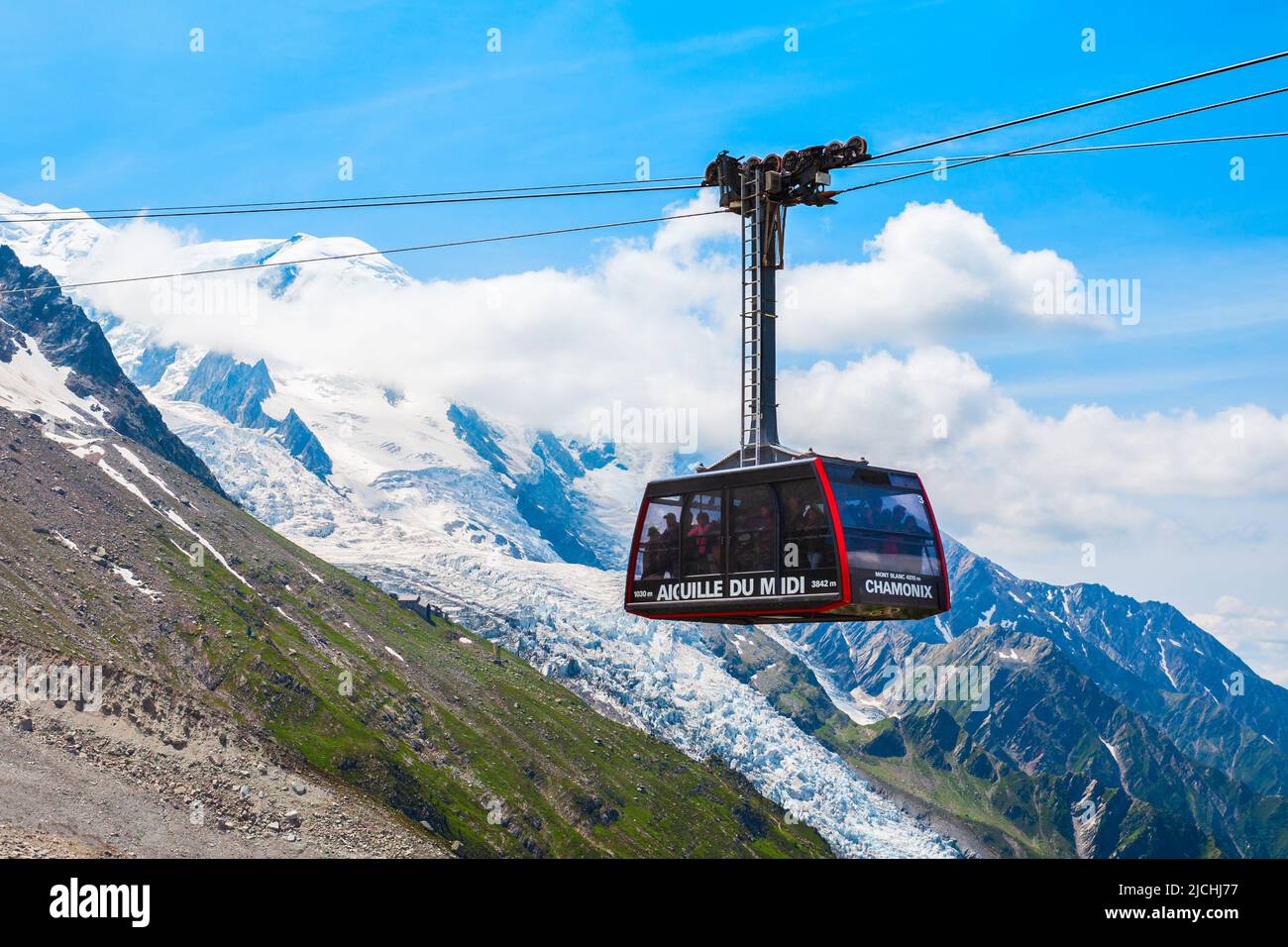 CHAMONIX, FRANCE - JULY 18, 2019: Cable car coach going to the Aiguille du Midi 3842 m mountain in the Mont Blanc massif in the French Alps near the C Stock Photo