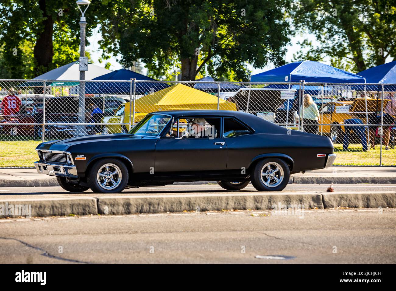 A 1969 Chevy Nova arrives at the American Graffiti charity Car Show at the Modesto Junior College campus June 11-12 2022 Stock Photo