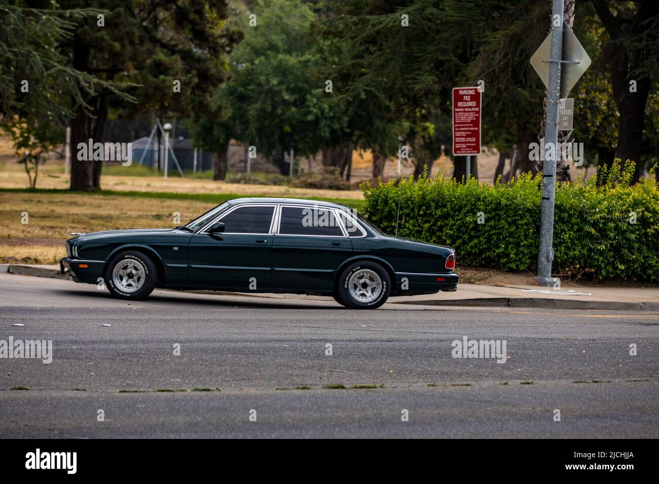 A Customized Jaguar XJ6 arrives at the American Graffiti charity Car Show at the Modesto Junior College campus June 11-12 2022 Stock Photo