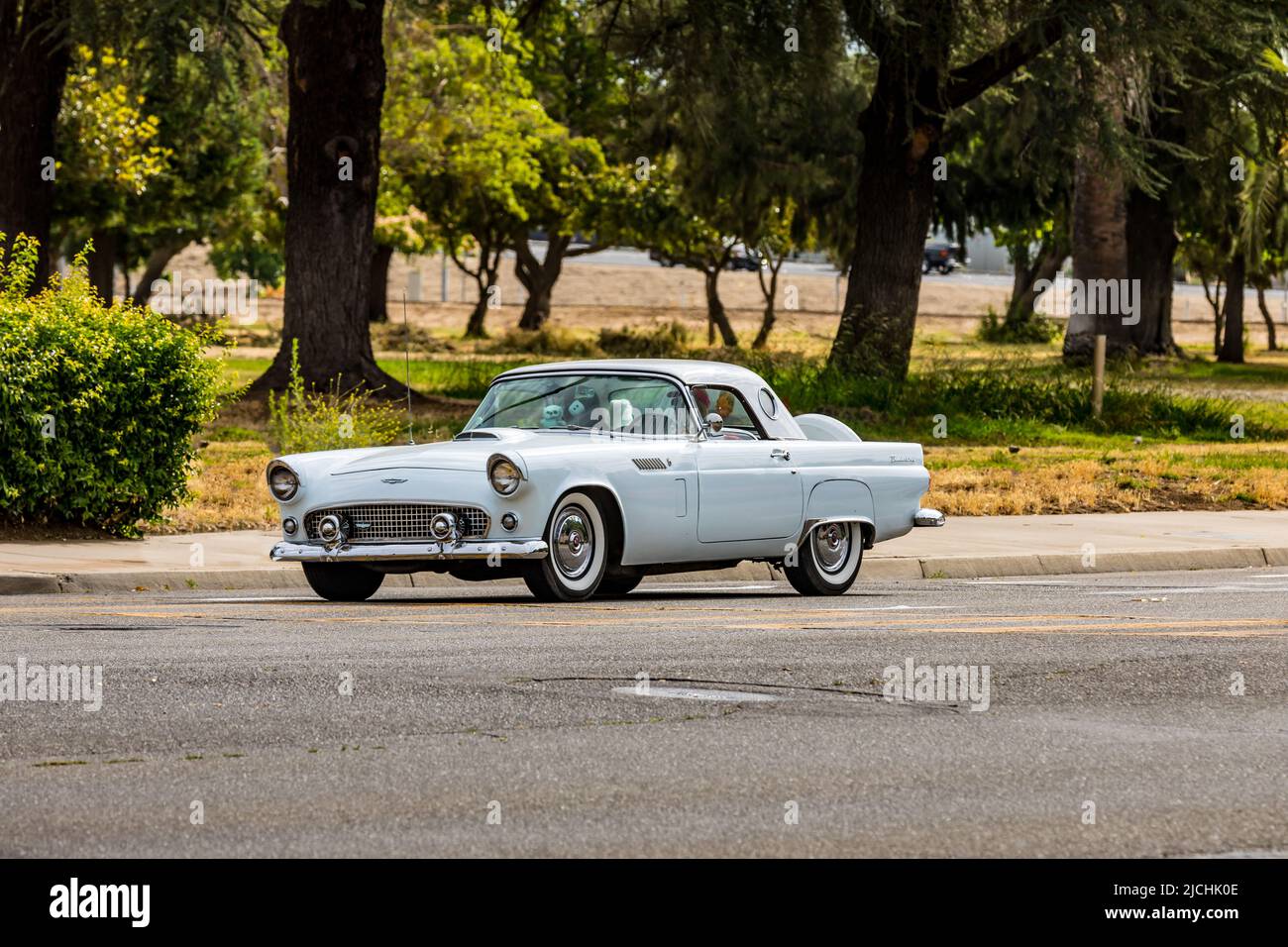 A 1950s Ford Thunderbird arrives at the American Graffiti charity Car Show at the Modesto Junior College campus June 11-12 2022 Stock Photo