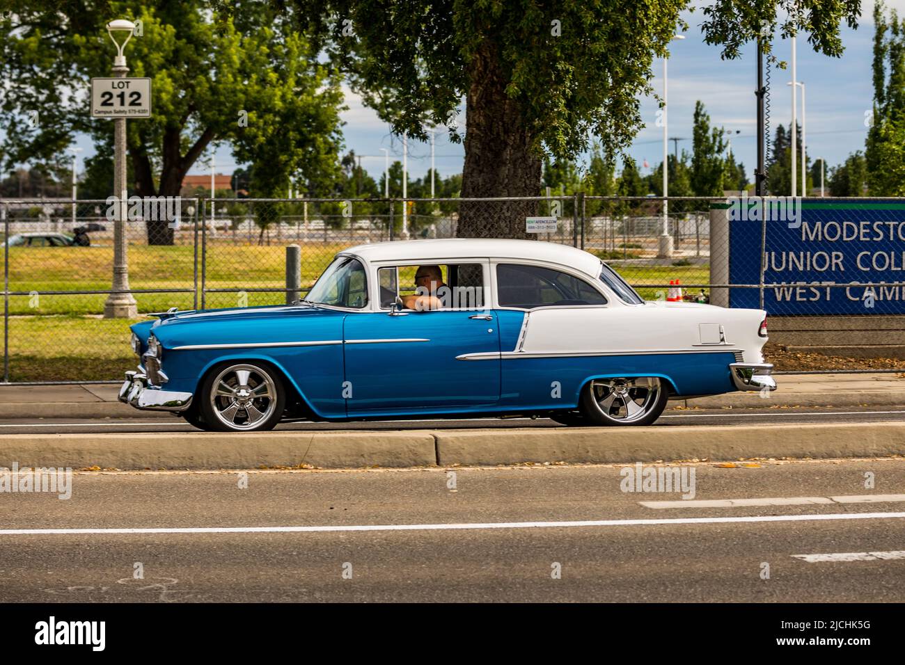 A 1955 Chevrolet Belair 2 door arrives  at the American Graffiti charity Car Show at the Modesto Junior College campus June 11-12 2022 Stock Photo