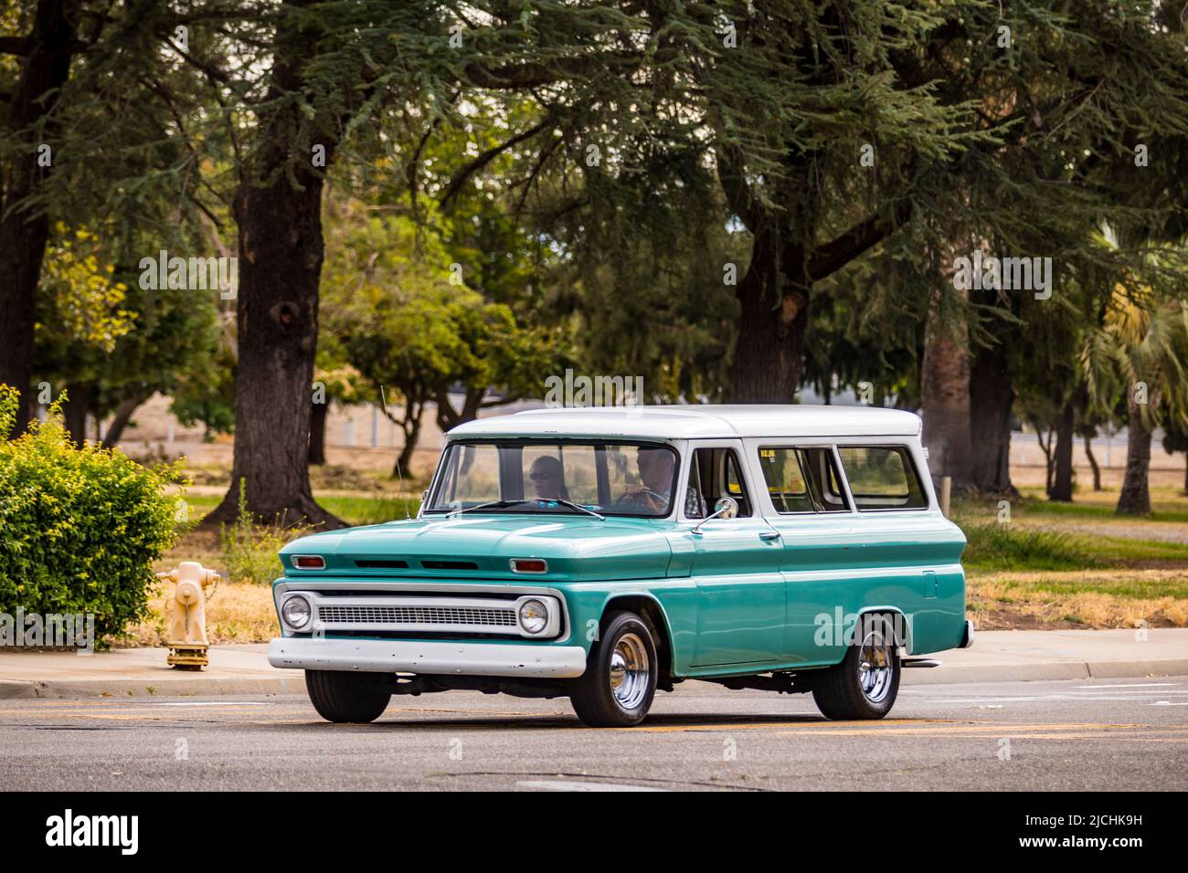 1965 Chevy Suburban arrives at the American Graffiti charity Car Show at the Modesto Junior College campus June 11-12 2022 Stock Photo