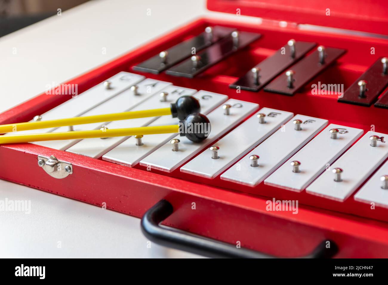 Portable xylophone or sticcado with drum sticks for educational music ...