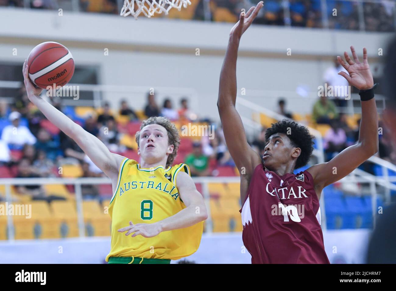 Doha, Qatar. 13th June, 2022. Kye Savage (L) of Australia Basketball