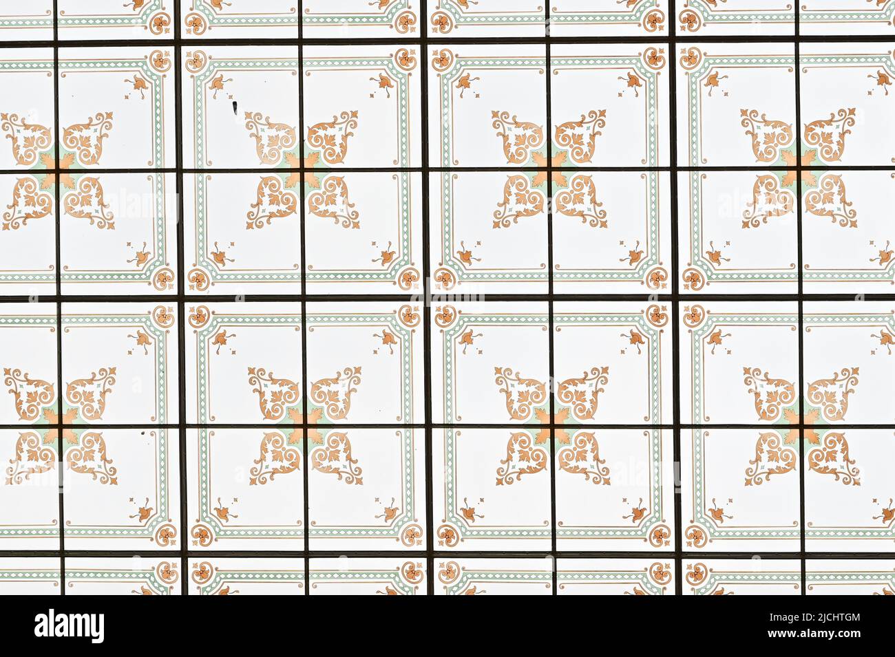 A symertical image of the stained glass roof in Prague's Muzejni Komplex Stock Photo