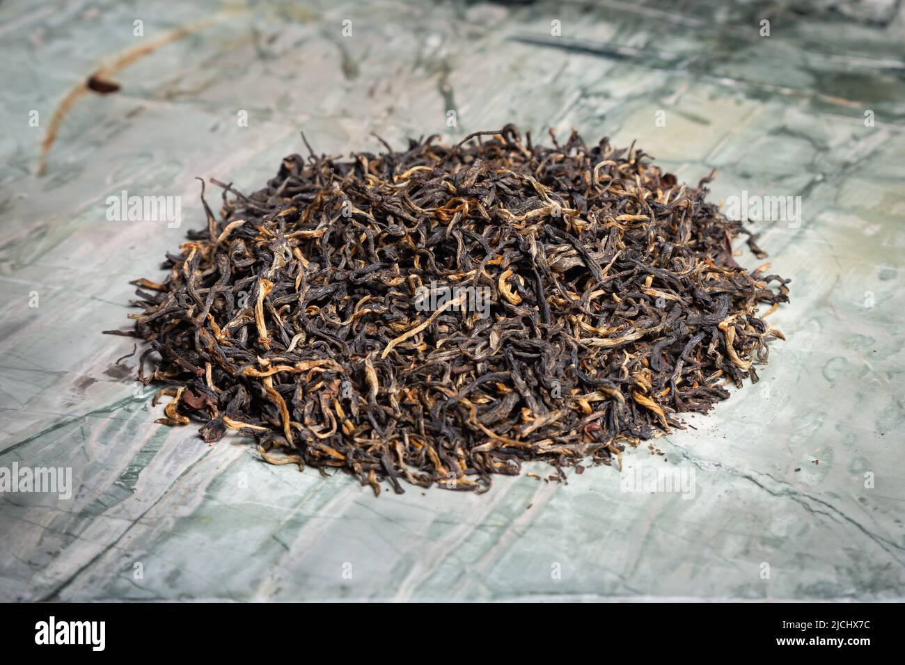 Puerh fermented Chinese tea in a roll Stock Photo Alamy