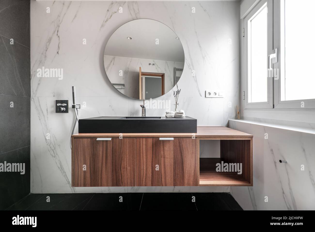 Modern design bathroom with wooden black porcelain sink