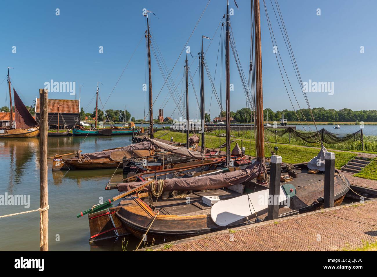 Enkhuizen, Netherlands, June 2022. Traditional fishing boats and nets hanging out to dry at the Zuiderzee Museum in Enkhuizen. High quality photo. Sel Stock Photo