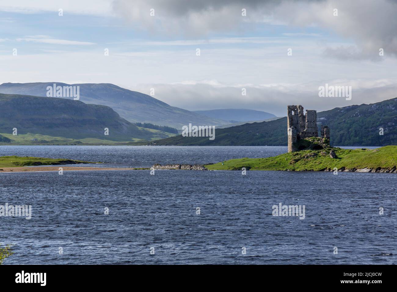 The ruins of Ardvreck Castle in the Scottish Highlands on the shores of Loch Assent. On The North Coast 500, NC500, Tourist Trail in  Scotland. Stock Photo