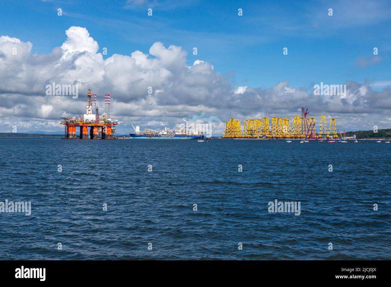 Stored Oil Rigs in Cromarty Firth in the North Coast of Scotland. Rigs are services and stored in the large Firth. Stock Photo