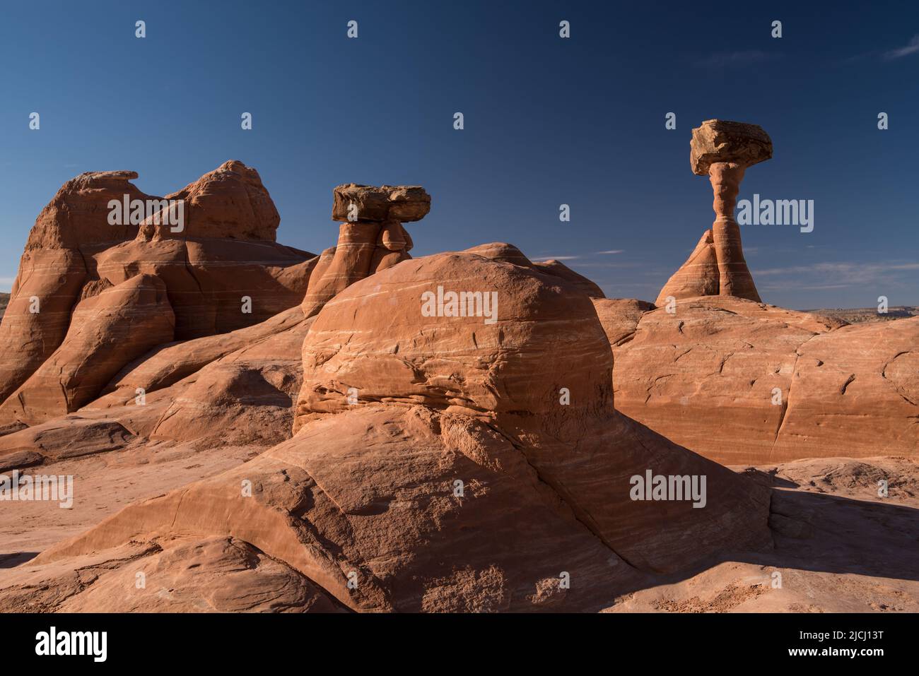 Toadstool rock formations near Kanab, Ut. USA. These unique formations are caused by erosion of soft stone underneath harder rock. Stock Photo