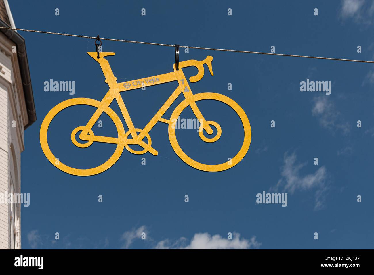 a hanging sign of a bicycle marking Tour de France competition in Vejle, Denmark, june 13, 2022 Stock Photo