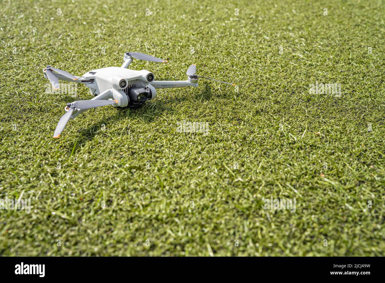 DJI Mini 3 Pro resting on the ground Stock Photo