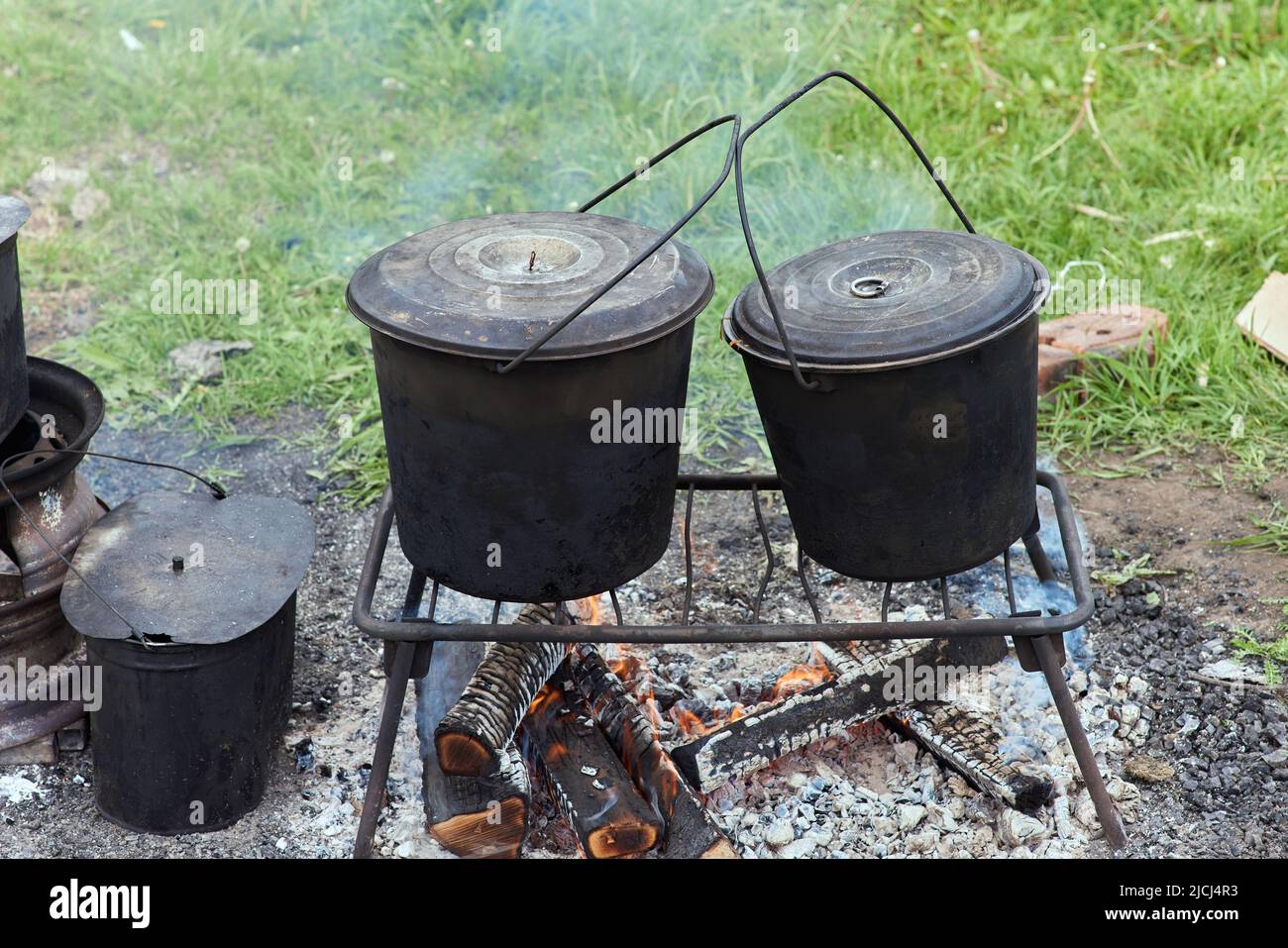 Hiking pot, Bowler in the bonfire. in cauldron at the stake. Traveling ...