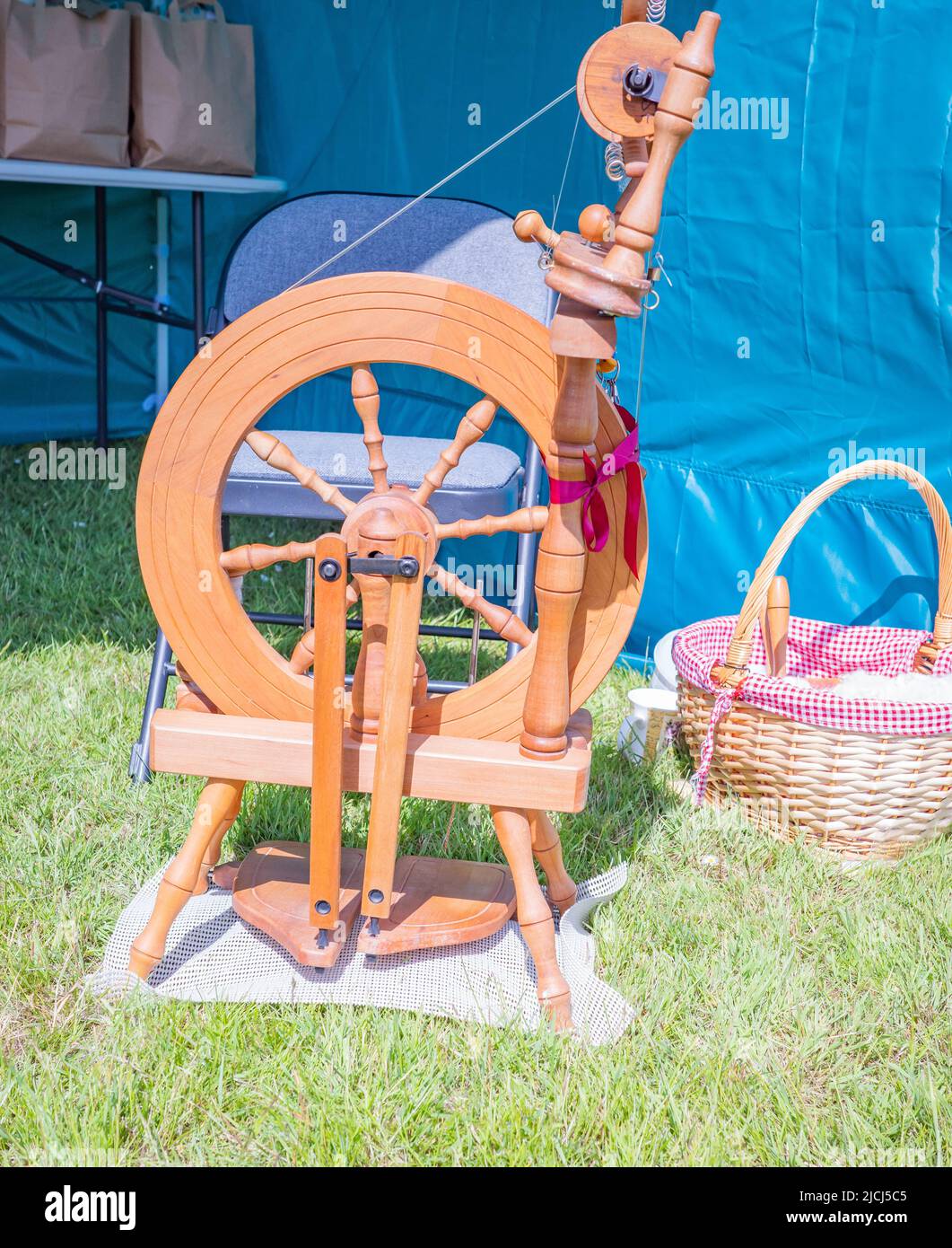 Dilham, Norfolk, UK June 11 2022. Traditional wooden spinning wheel