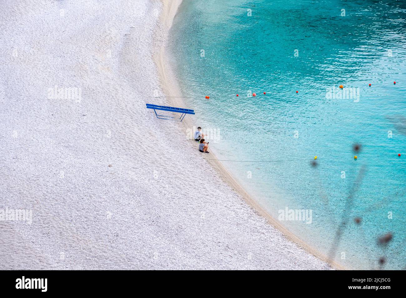 Lefkada Island, Greece-06.05.2022. Young tourists visiting Agiofili Beach early morning before it get crowded. Stock Photo