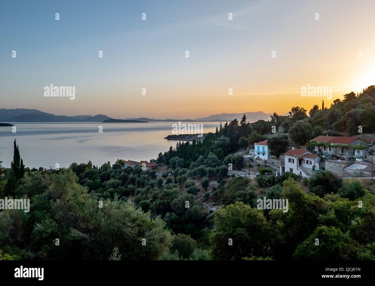 A beautiful sunrise over a village in Ithaca, Greece Stock Photo Alamy
