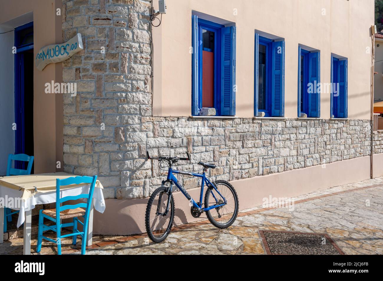 Ithaca Island, Greece-05.25.2022. A restaurant by the seafront of Kioni catering for tourists. Stock Photo