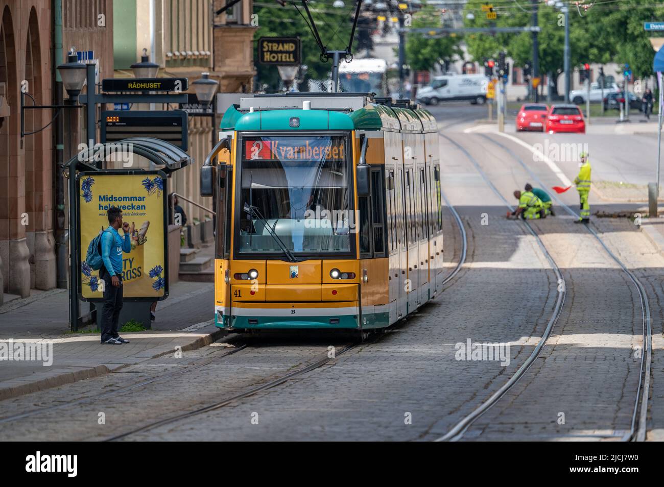 Tram on main street Drottninggatan in the city center of Norrkoping, Sweden. Norrkoping is a historic industrial town. Stock Photo