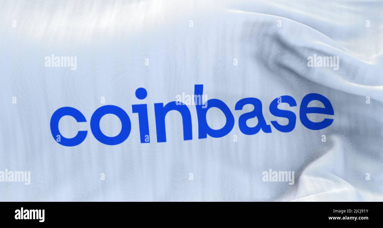 New York, USA, June 2022: White flag with Coinbase logo waving ...
