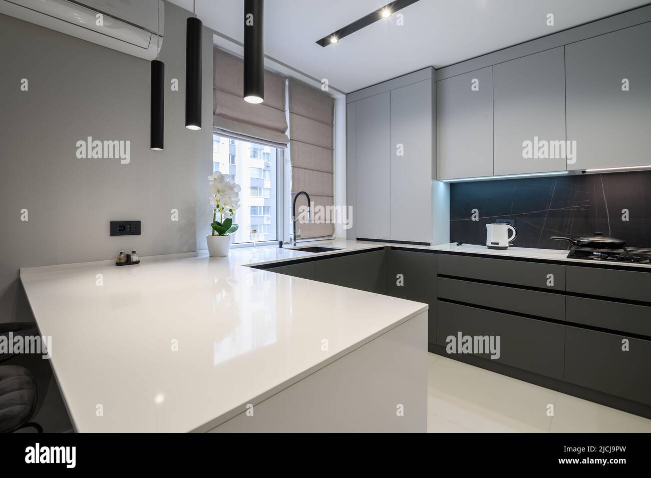Luxury dining room and kitchen in studio apartment Stock Photo Alamy