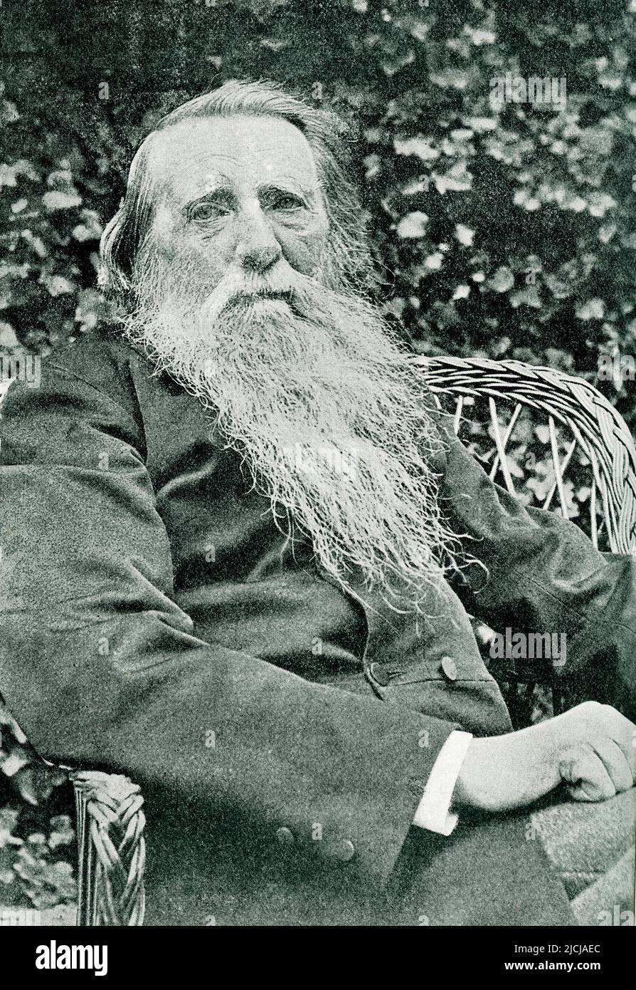 The 1895 caption reads: 'Mr Rusking from a plate taken by Miss Ackland at Brantwood.' The 1895 caption reads: ' John Ruskin, (1819-1900) one of the greatest figures of the Victorian age,  was an English critic of art, architecture, and society. A gifted painter, he had a distinctive prose style and was an important example of the Victorian Sage, or Prophet: a writer of polemical prose who seeks to cause widespread cultural and social change. Brantwood is a historic house, estate and vibrant center for the arts on the shore of Coniston Water in England.  It was once home to John Ruskin. Stock Photo