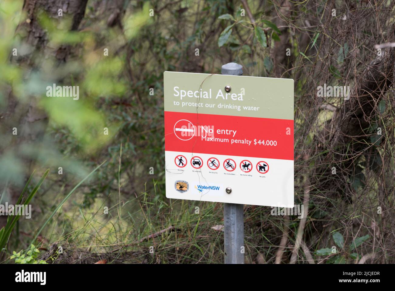 A sign at Cataract Dam in New South Wales, Australia warning of a $44,000 fine for trespass in restricted areas near the 97 gigalitre dam Stock Photo